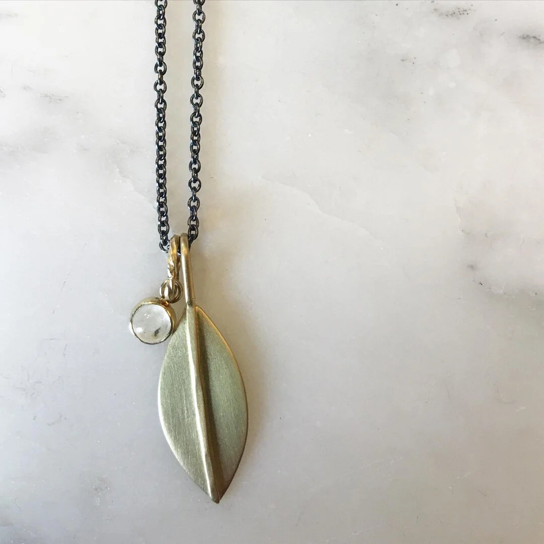 Moonstone18kPetalOxChain.jpg