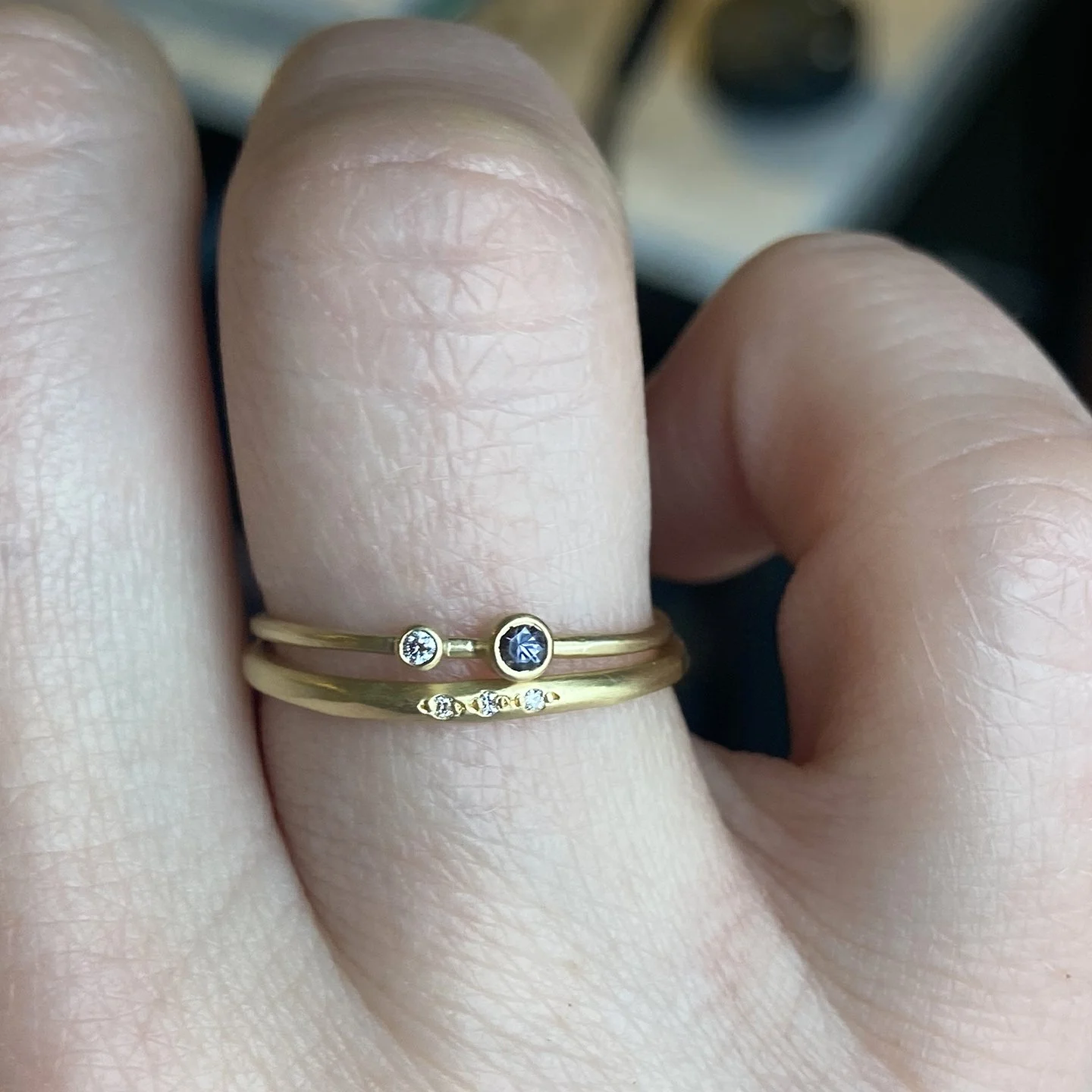 SapphireAndDiamondSkinnyVineRingTriplePave_onfinger.jpg