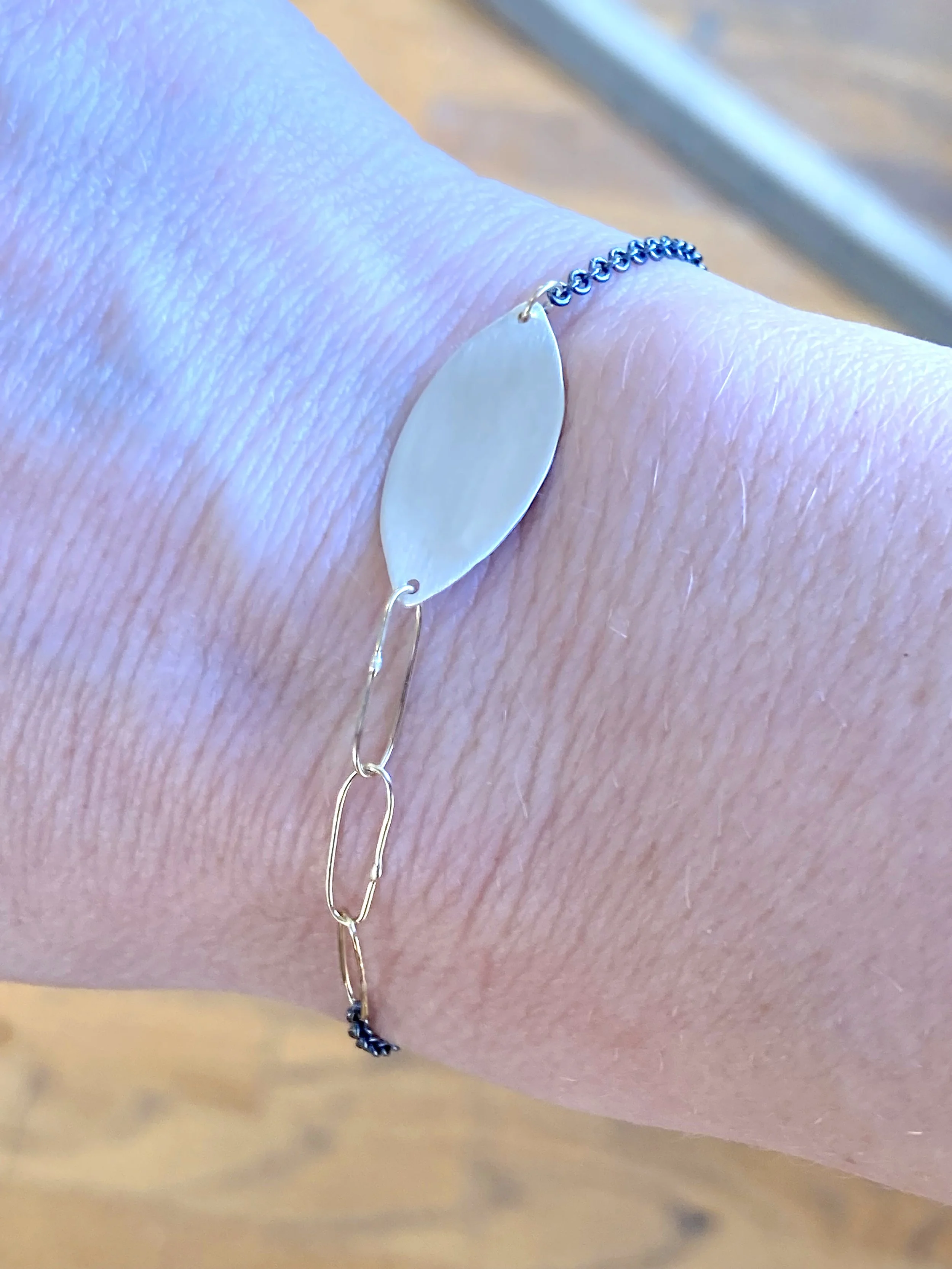 PetalAndPaperClipsonwrist.jpg