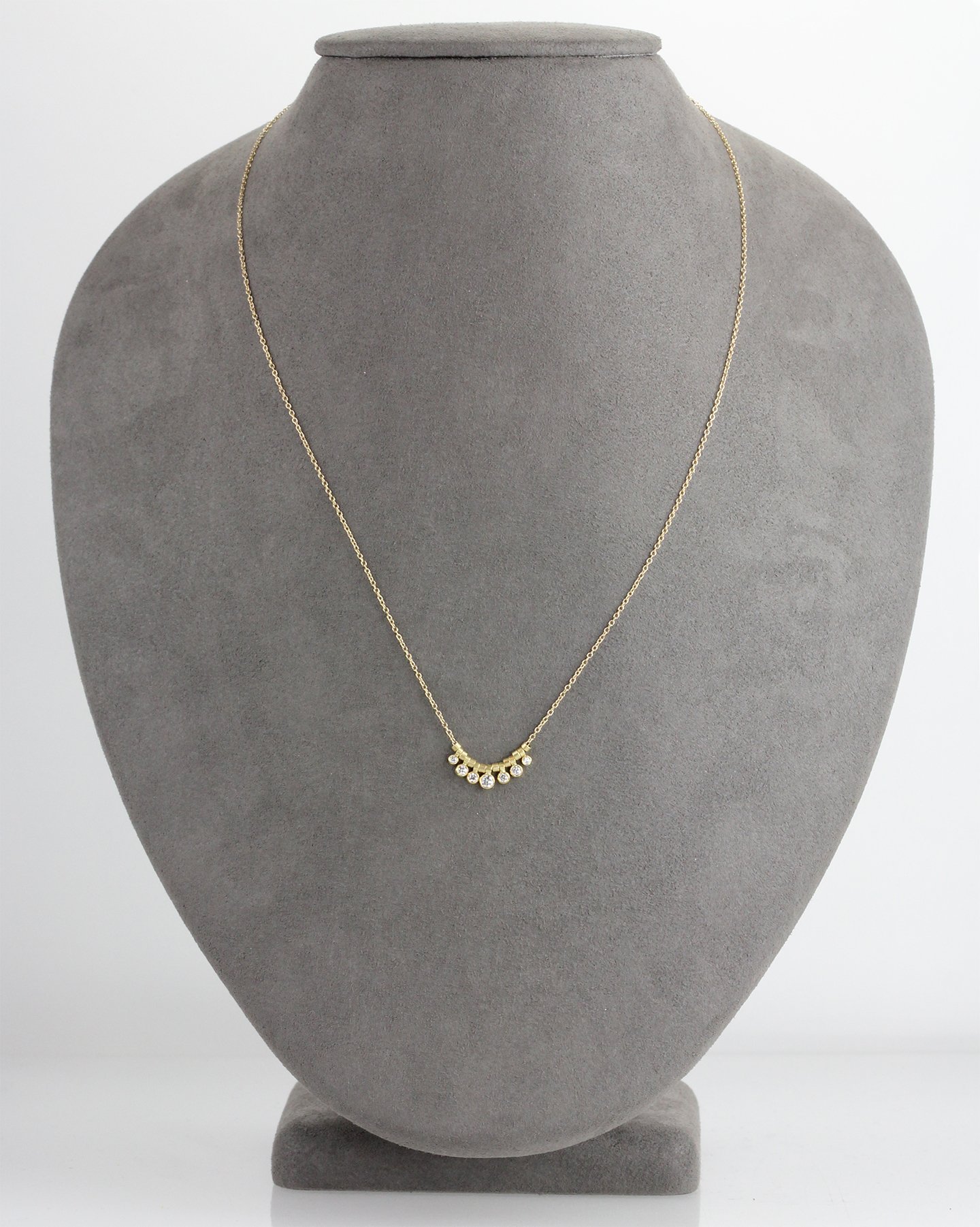 7DiamondMultibezelGoldChain.jpg