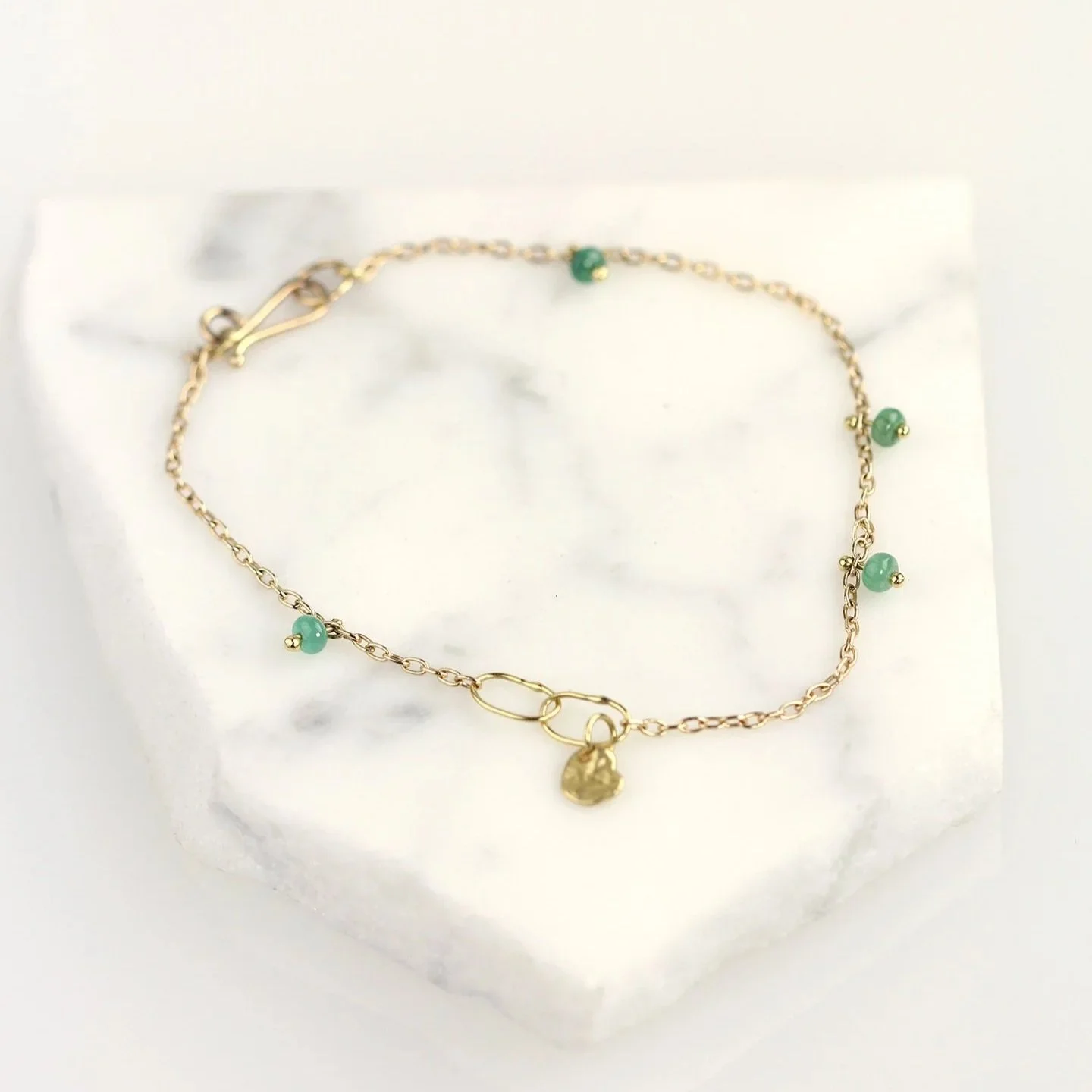 StoneStrandBraceletOnMarbleEmerald.jpg
