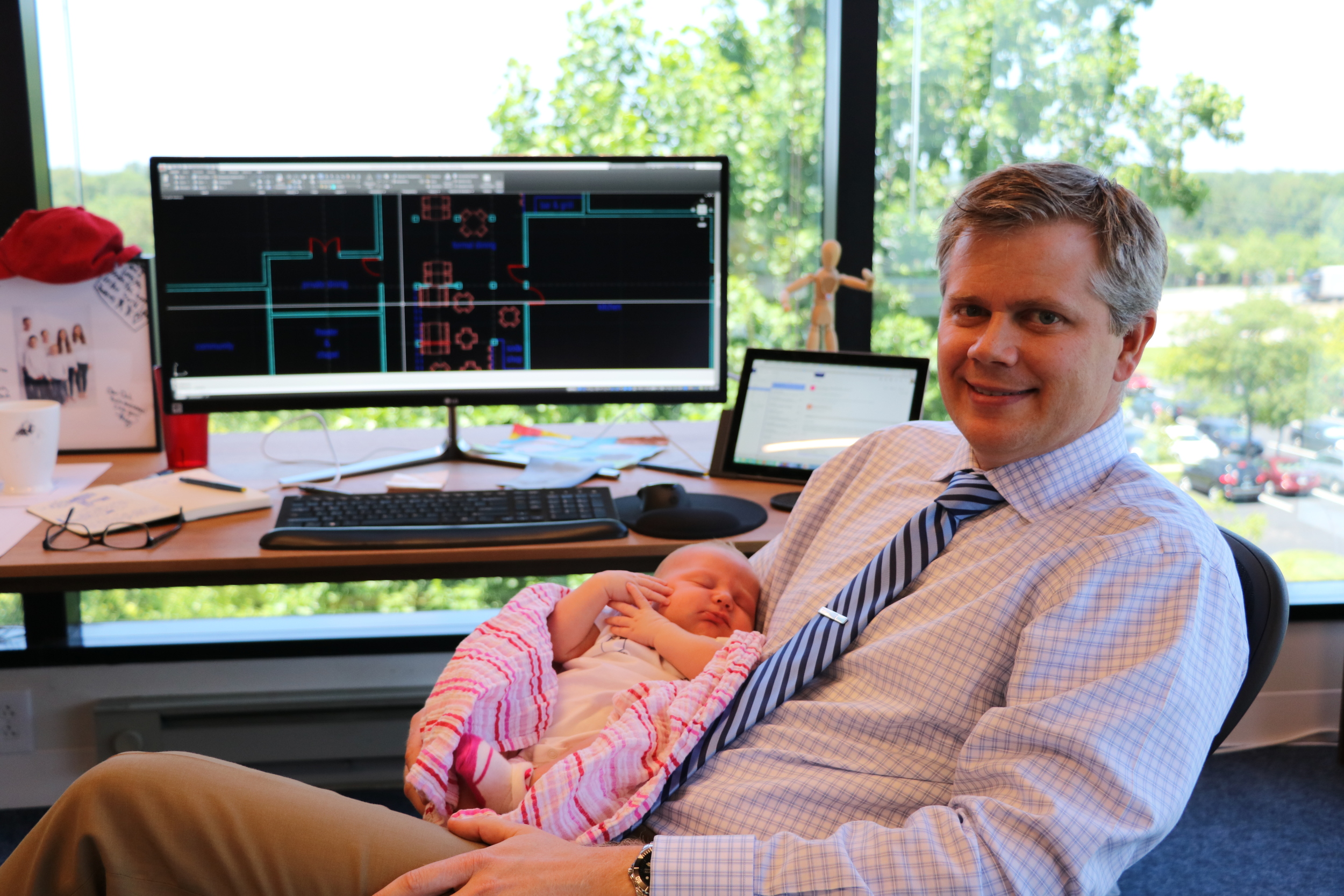 Brian with his new daughter Mattie (3 weeks old).