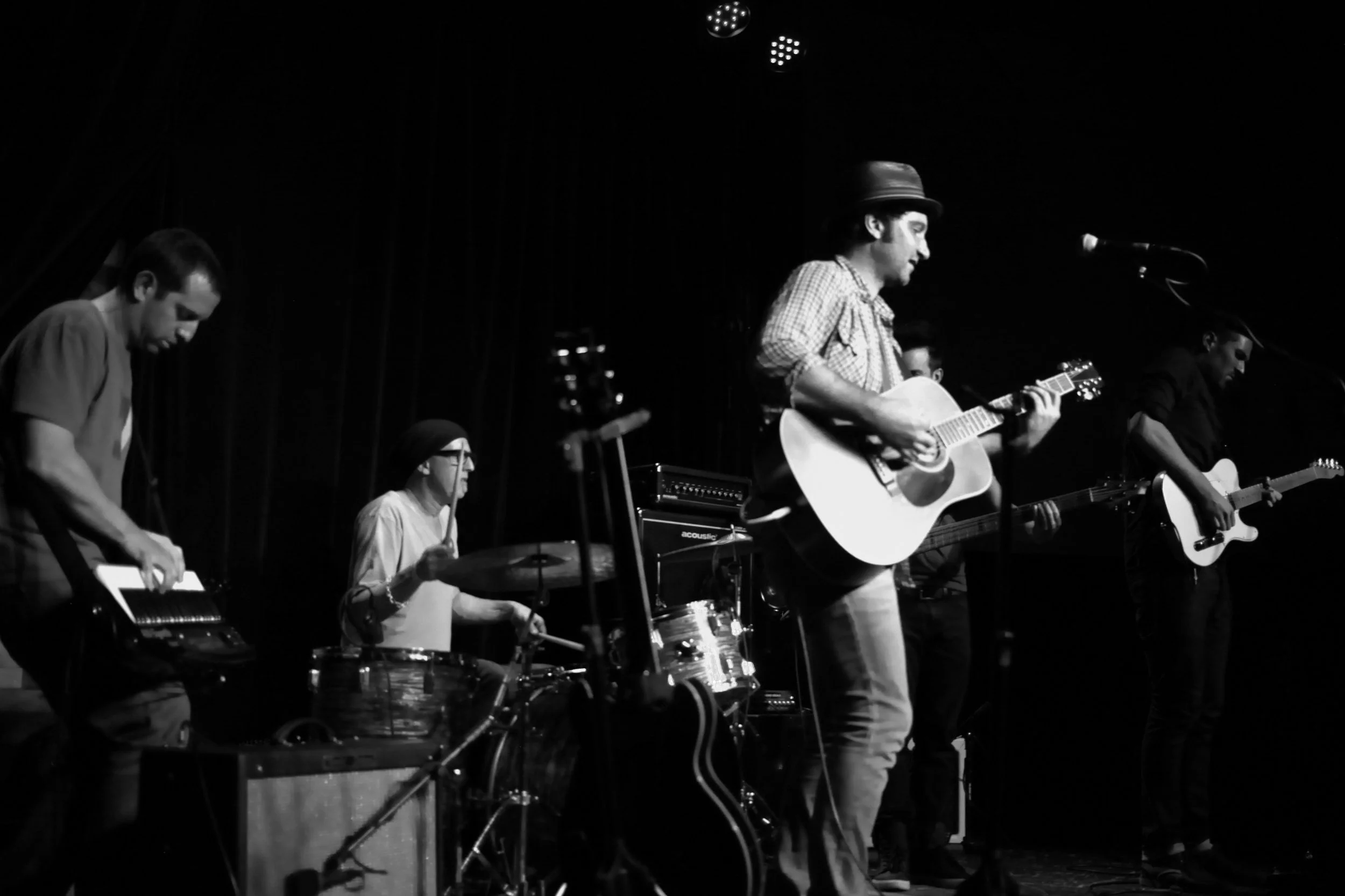 Mike Vitale, Jon Lacroix, Frank Reina, and Jason Lomheim performing at the Mike Vitale album release show at The Constellation Room in Santa Ana, CA. Photo courtesy of Angela Ratzlaff.