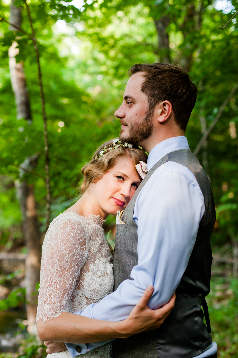  A close up of the bride and groom in the Adirondack woods 