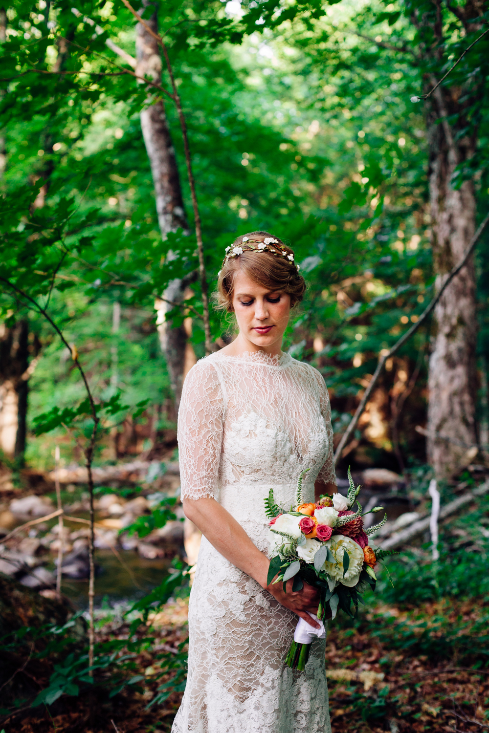  A bride poses with her bouquet in upstate New York 