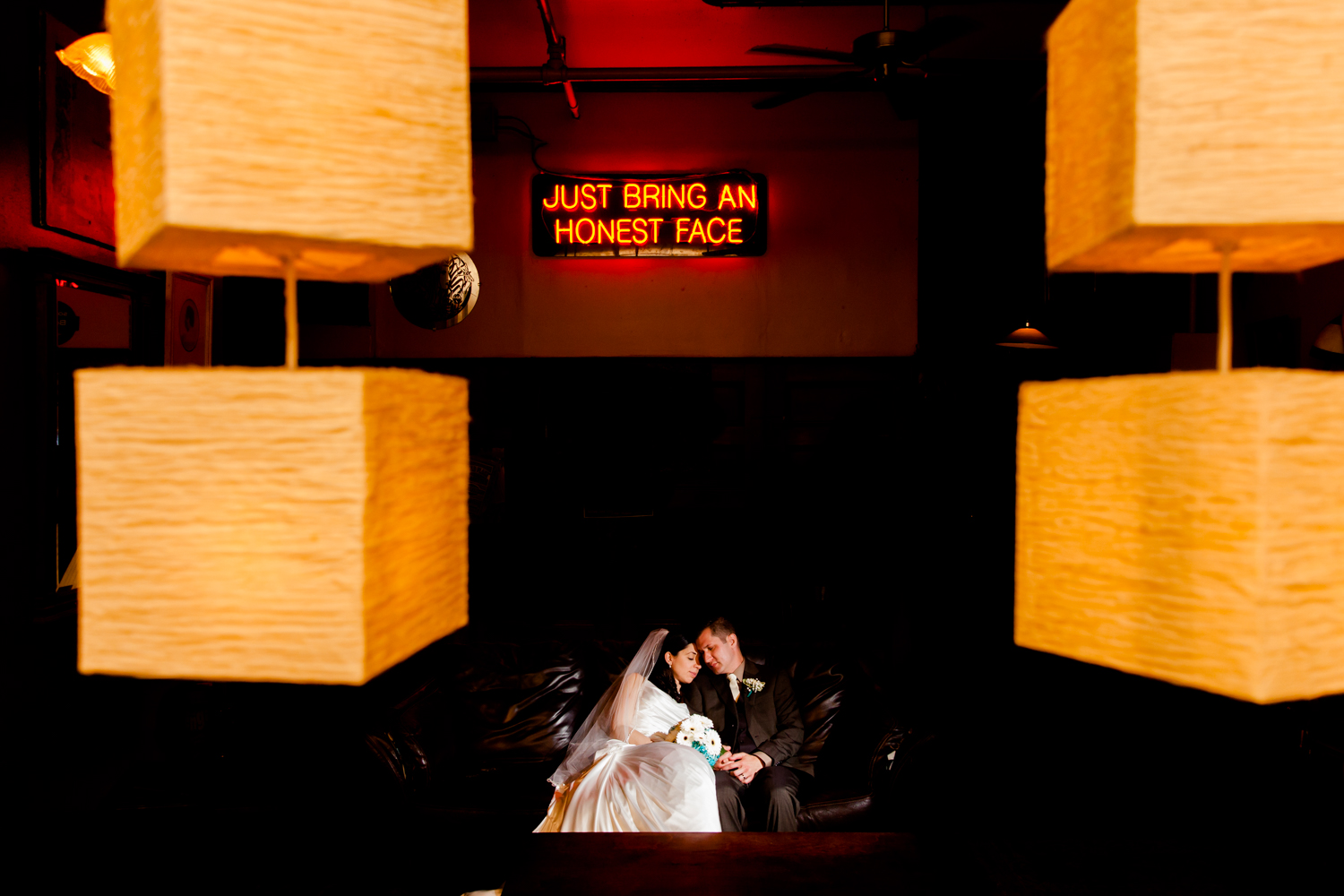 Gorgeous portrait of the bride and groom at Al's Wine and Whiskey Lounge in the historic Armory Square. 