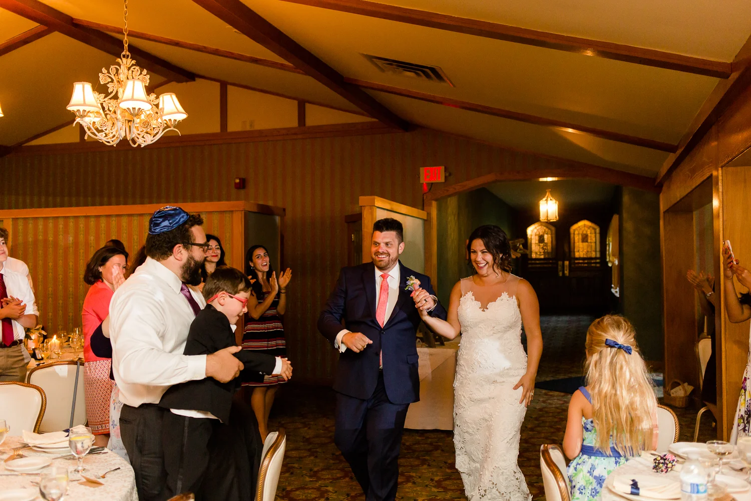Bride and groom are introduced into the reception