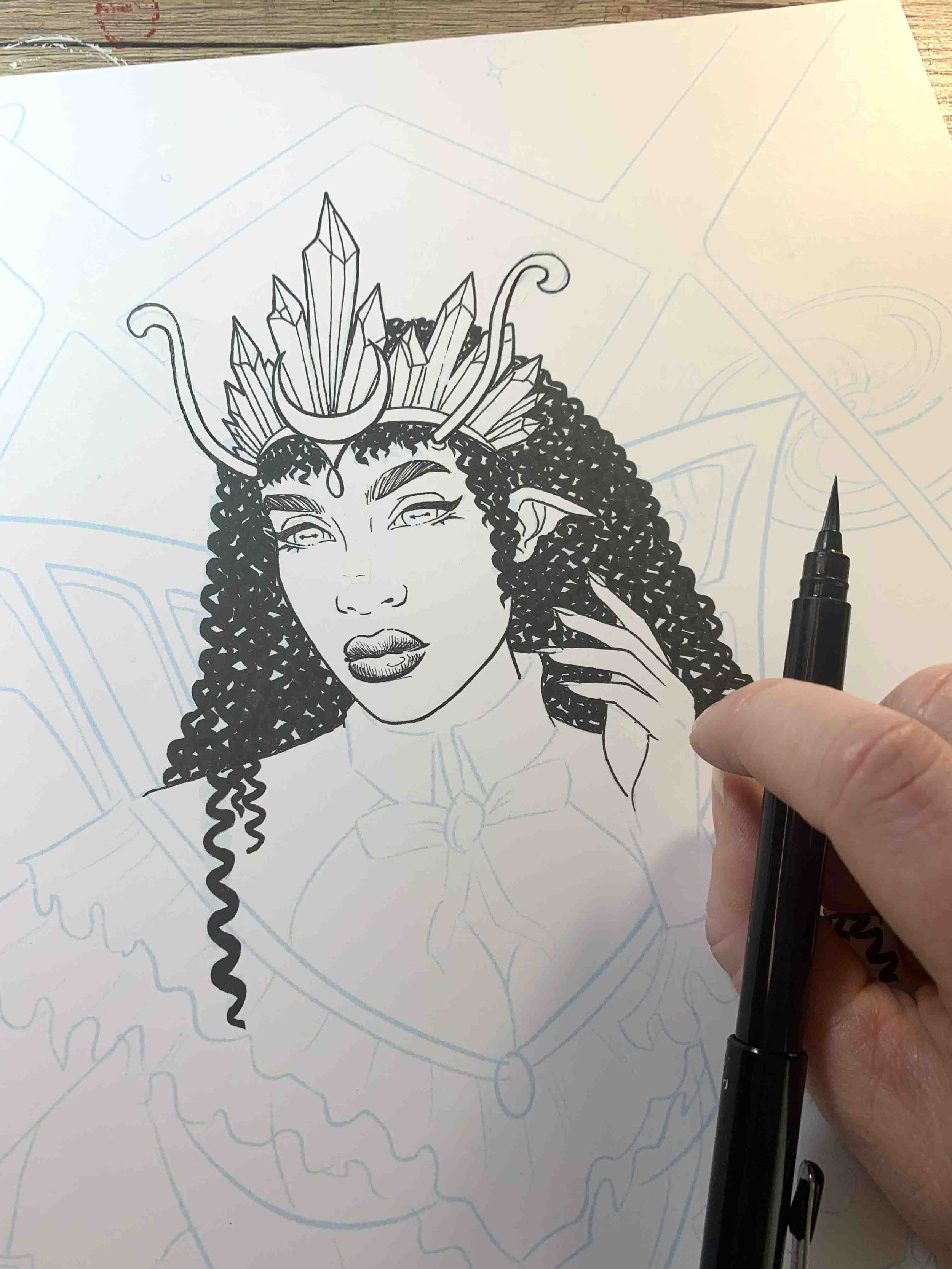 Working on the ink drawing for the oracle card illustration