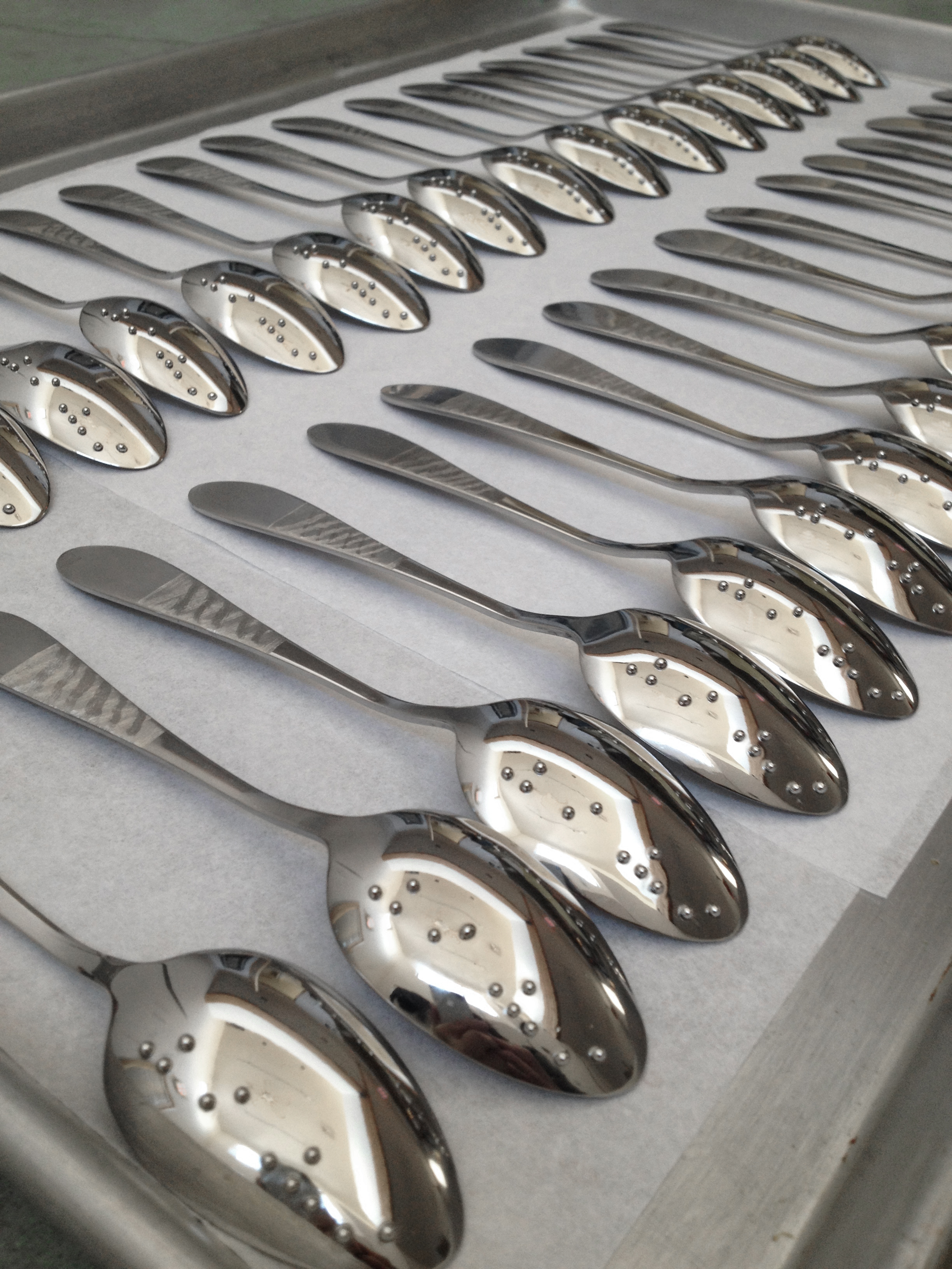  Welded braille on repurposed spoons. Ongoing since 2006. This set produced for  The Paseo pop-up Dinner in the Dark (2014) . 