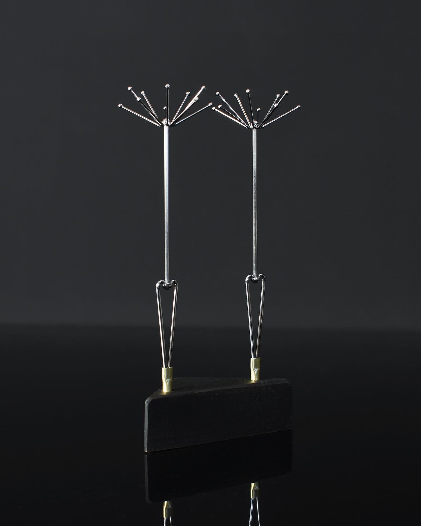 Martini Roulettes part 2.

A pair of martini picks in their wood &amp; brass stand and packaging. See previous post for more videos and info. 

Inspired by the form and aerodynamic structure of a single Salsify or Dandelion seedling, the pick will sp