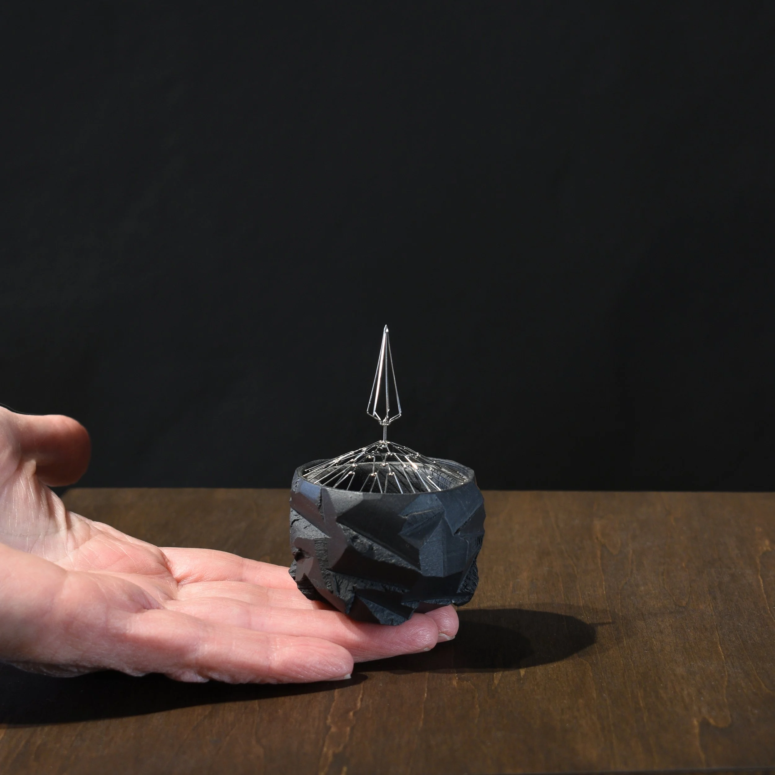 tiny sheltered cup in hand.jpg