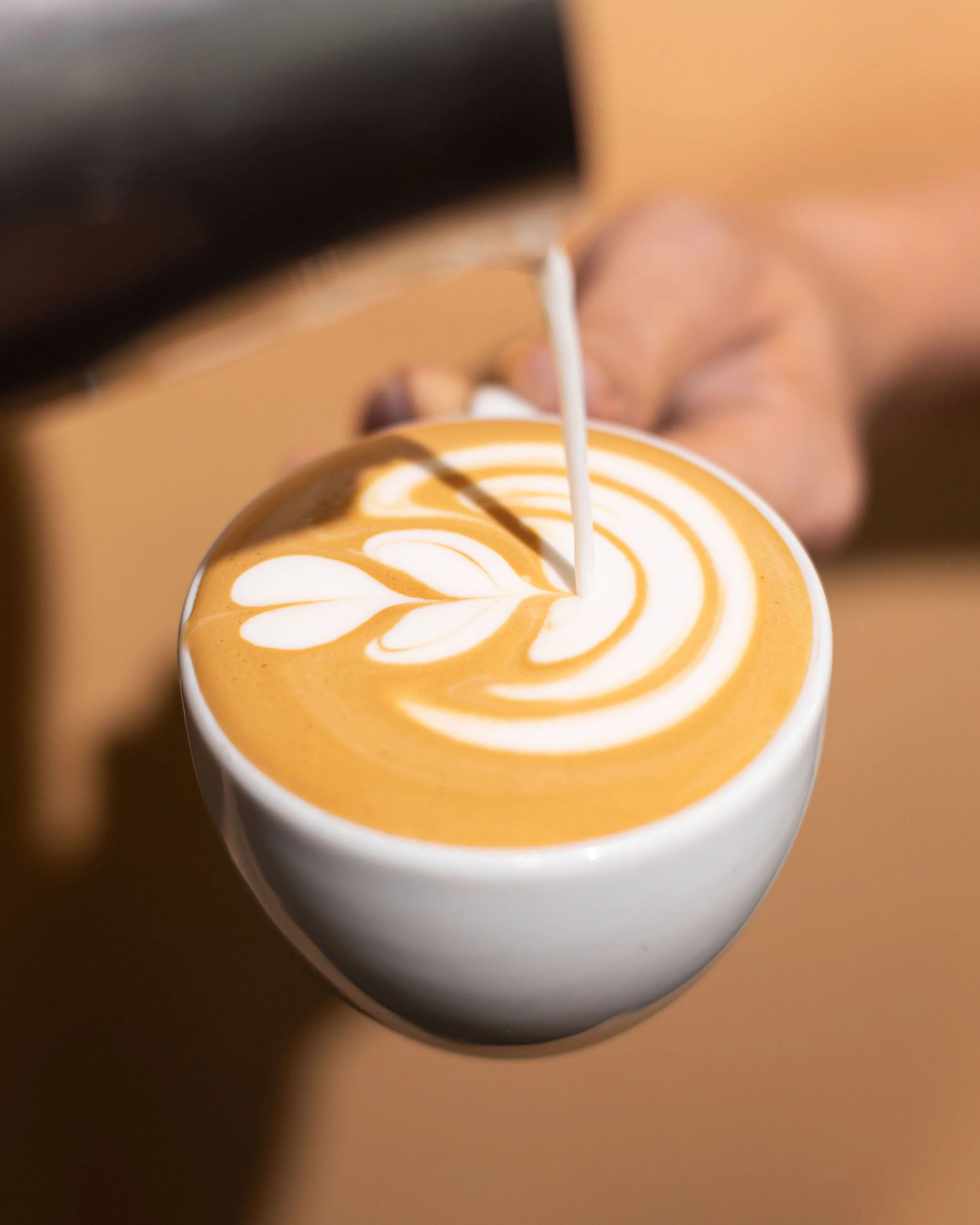 How to Make Latte Art — Crema Coffee Roasters