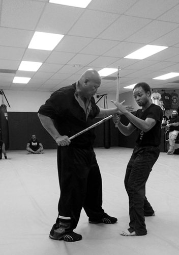 Grandmaster feeding Cameron during his Level 3 test.