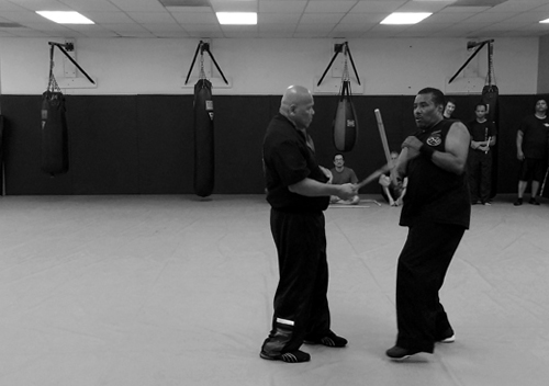 Dueling Grandmasters, GM Taboada feeding GM Richardson during GM Richardson's Level 5 test.