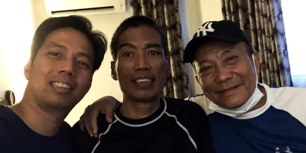 Eugene Nepangue (L), Dr. Ned Racaza Nepangue (C), and GM Monie Velez (R)
