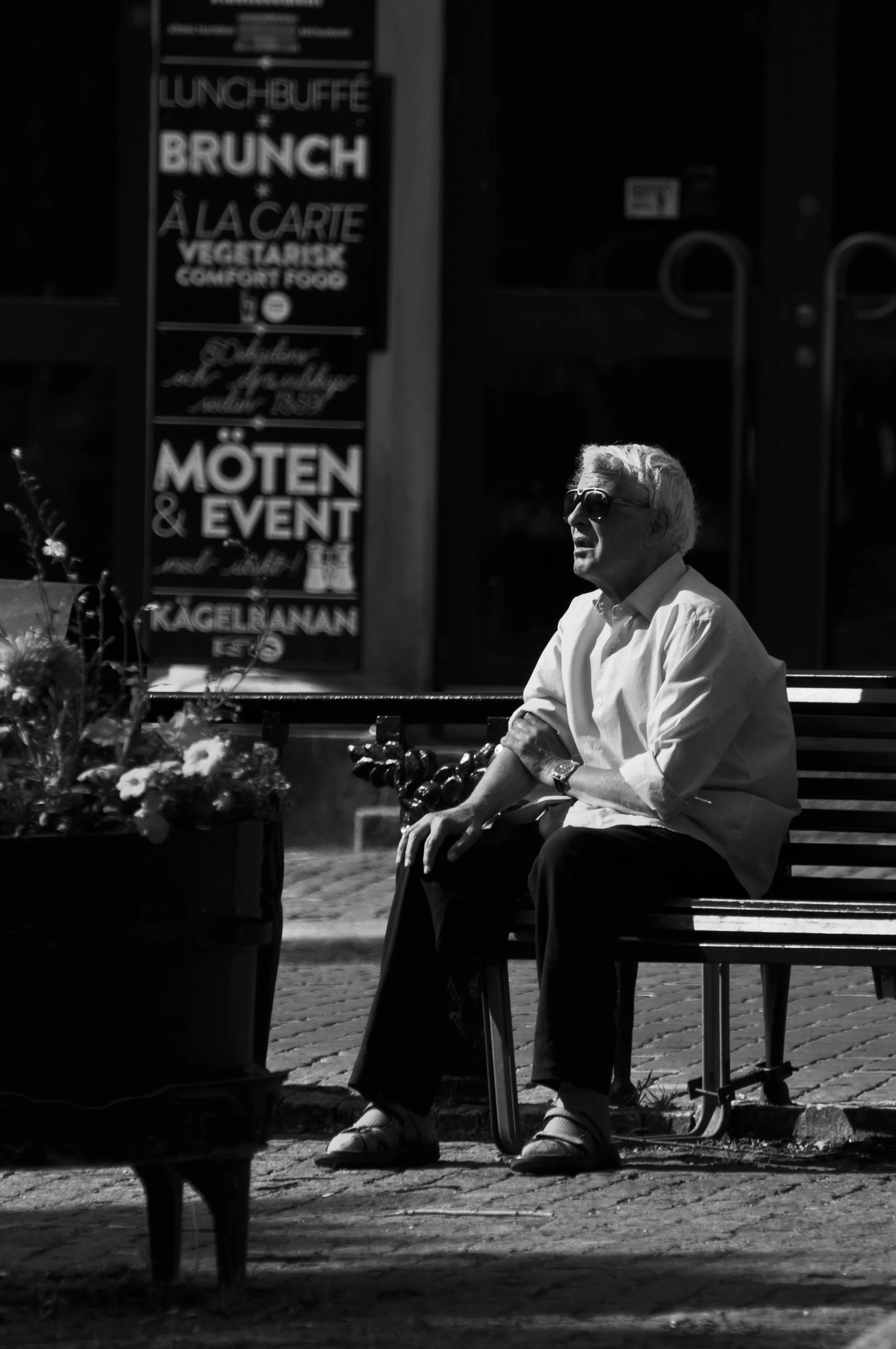 Sun worshipper. Mosebacke Torg, Stockholm, Sweden.
