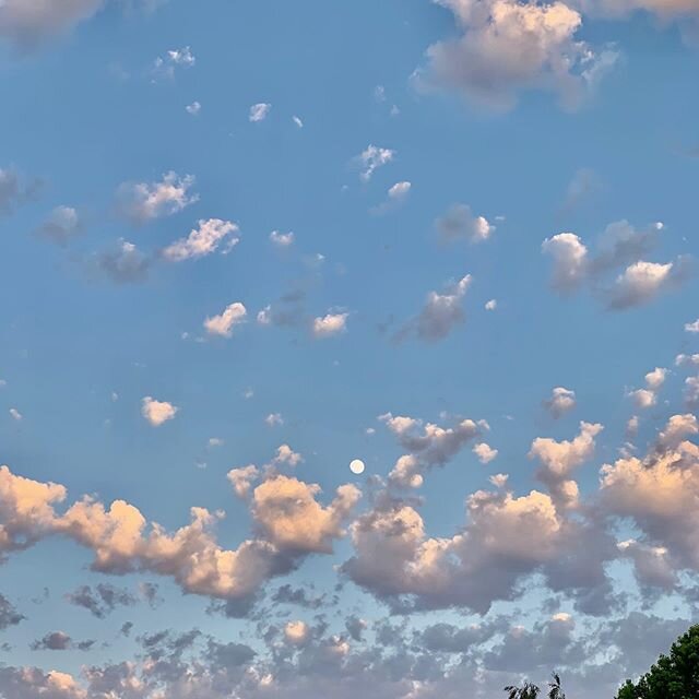 Moon among clouds