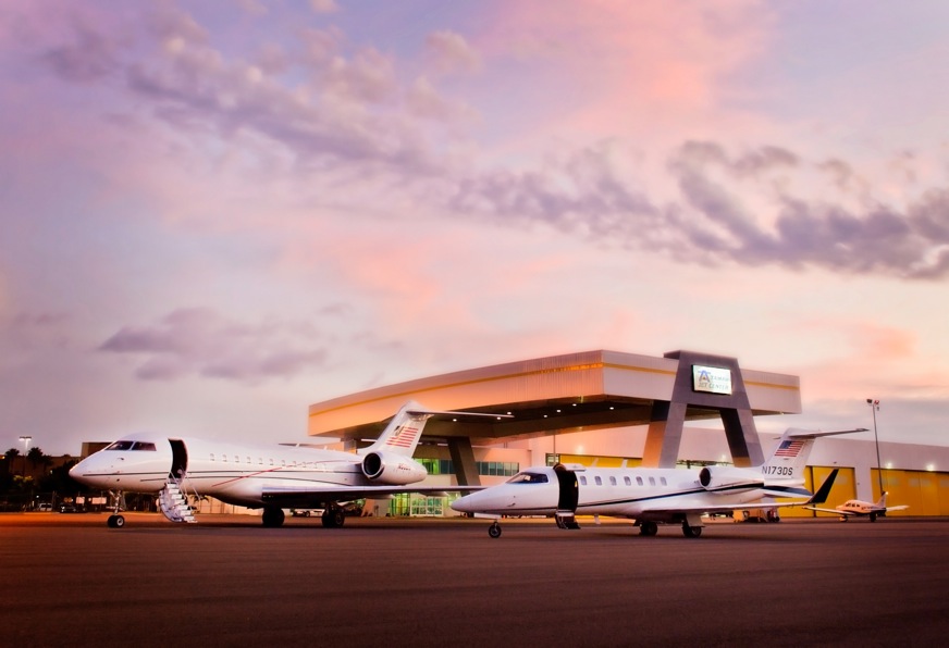 The Global 5000, shown here with the Elite Air-managed Lear 40, is the largest aircraft in the company’s charter fleet.