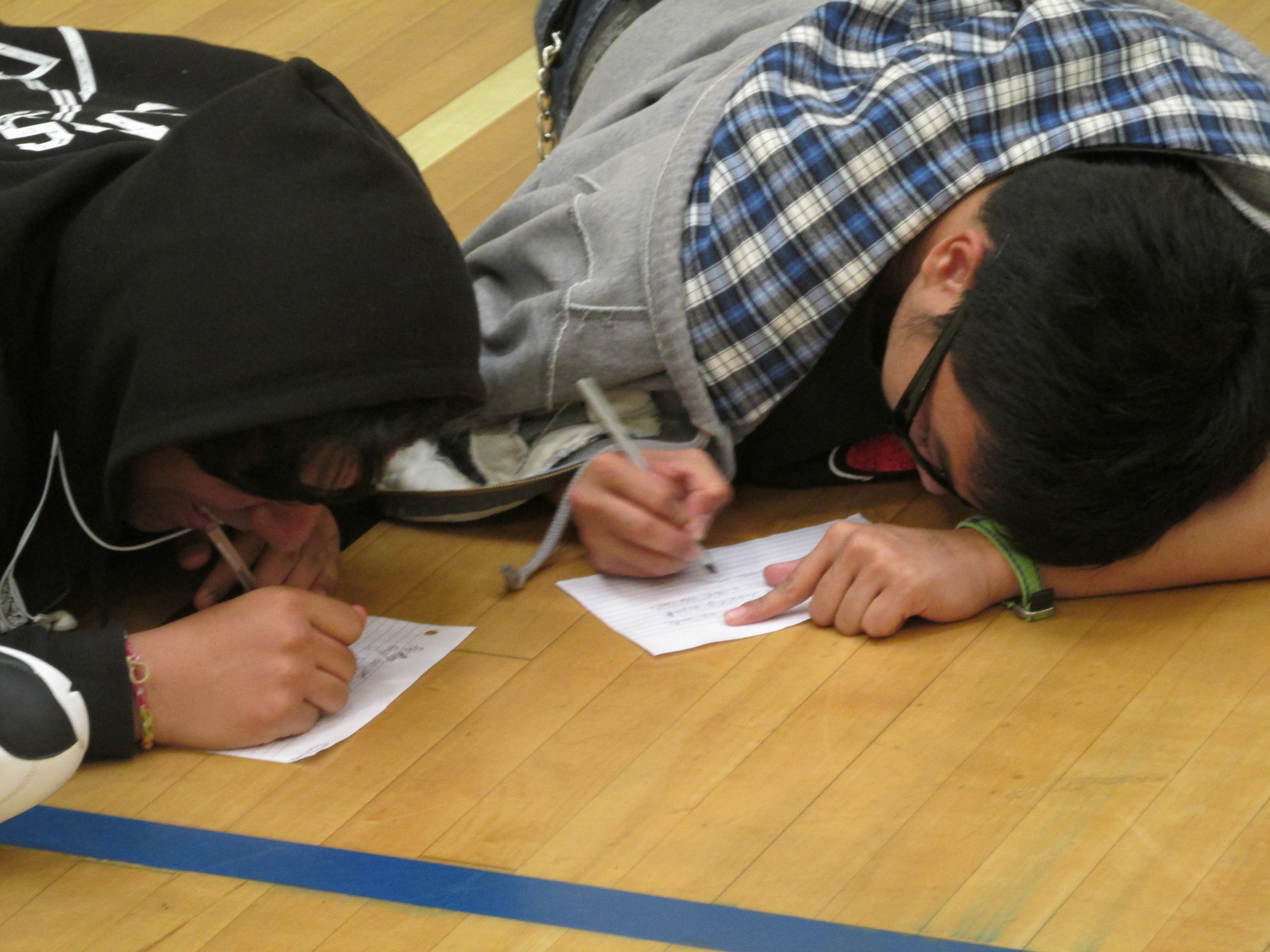 The students writting affirmations to there classmates