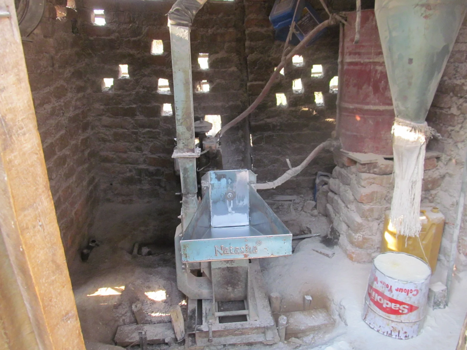 Corn grinding mills purchased from the proceeds of the beads sold in the U.S. "Gulu Beads".