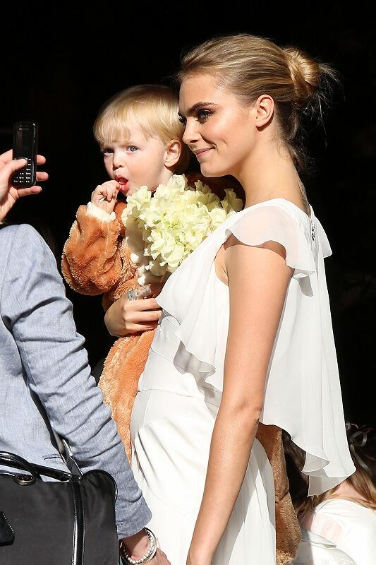 Cara and the ring bear in a teddy bear costume. We love it.