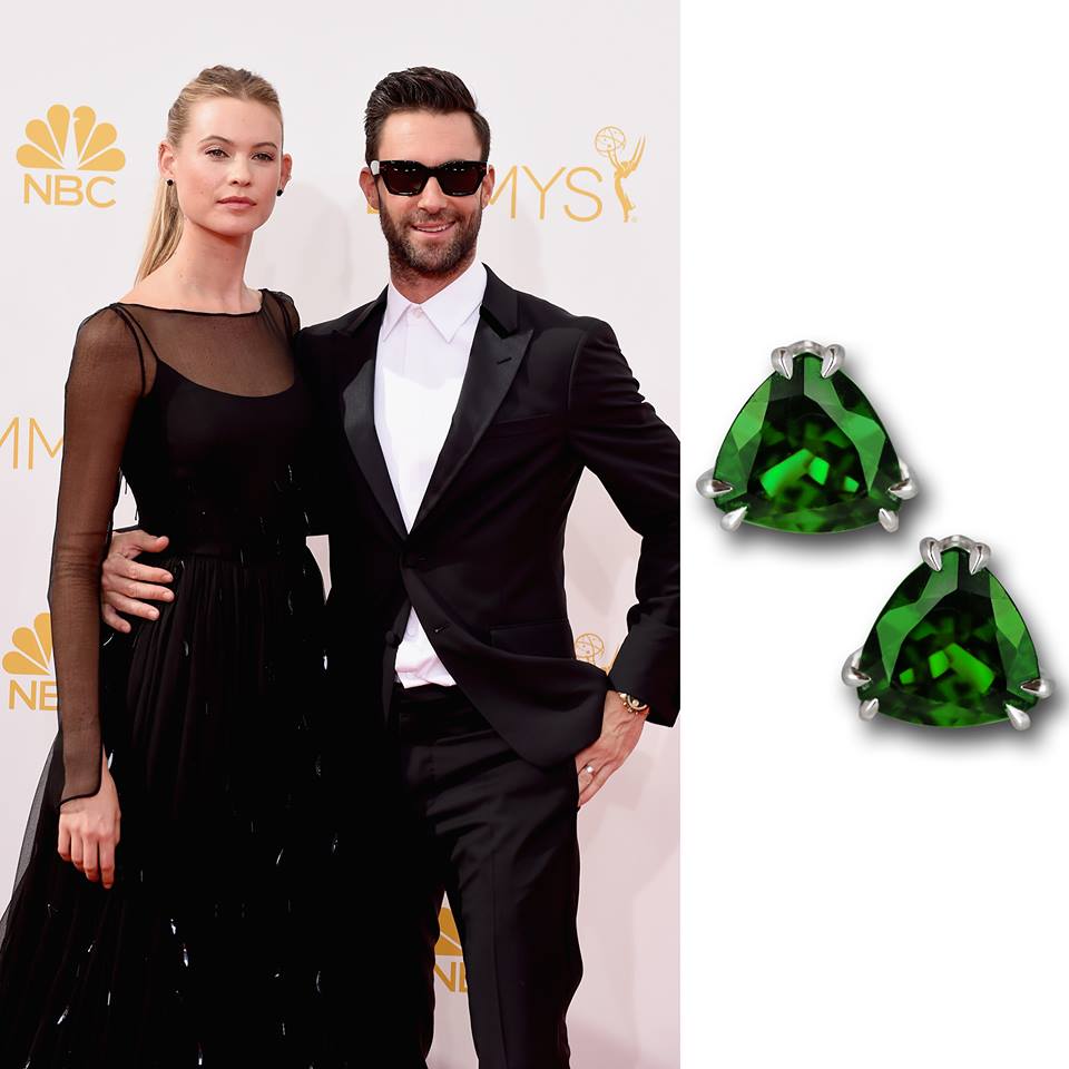 Behati Prinsloo and Adam Levine rocking their black and white looks popping some color with Jacob & Co. special cut favorite studs.
