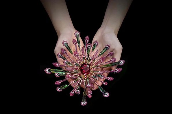 Wallace Chan “Vividity” brooch, with a rare elbaite tourmaline in the center.
