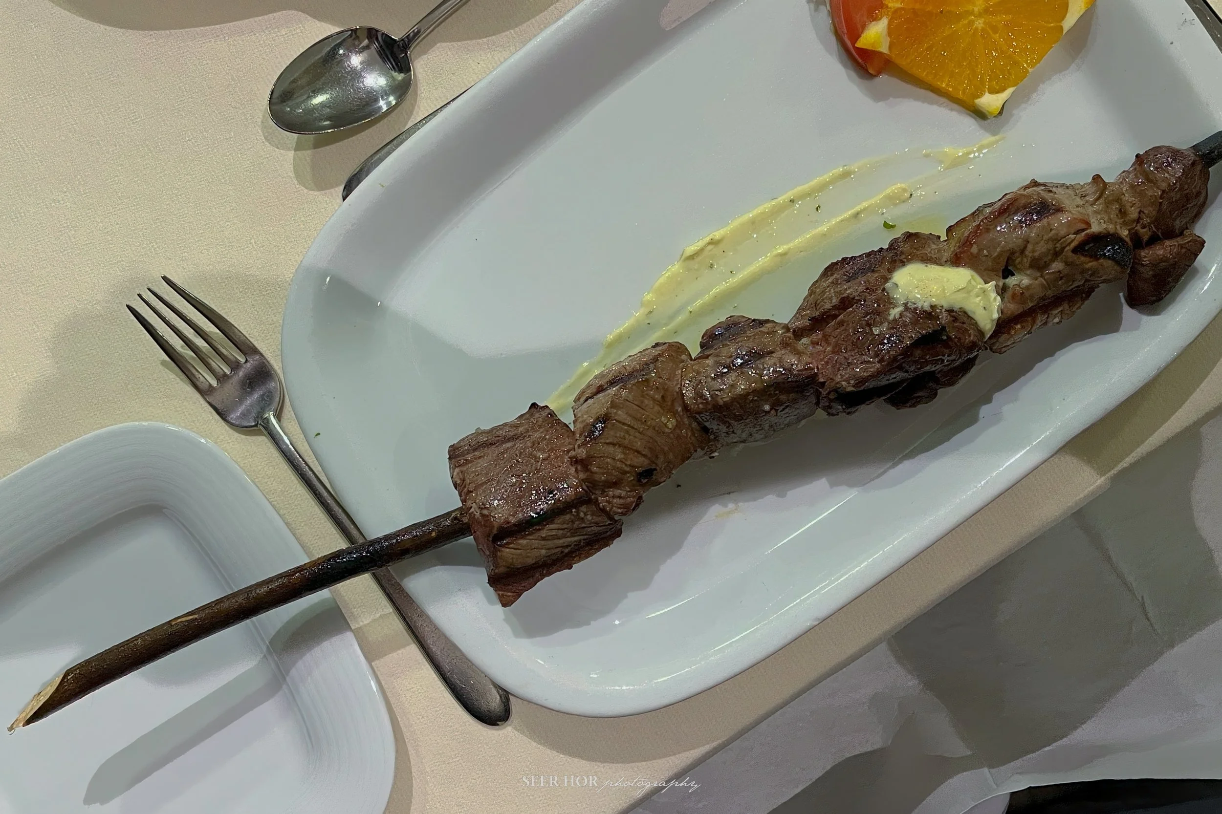 Traditional espetada grilled with laurel wood at Restaurante Casal da Penha.