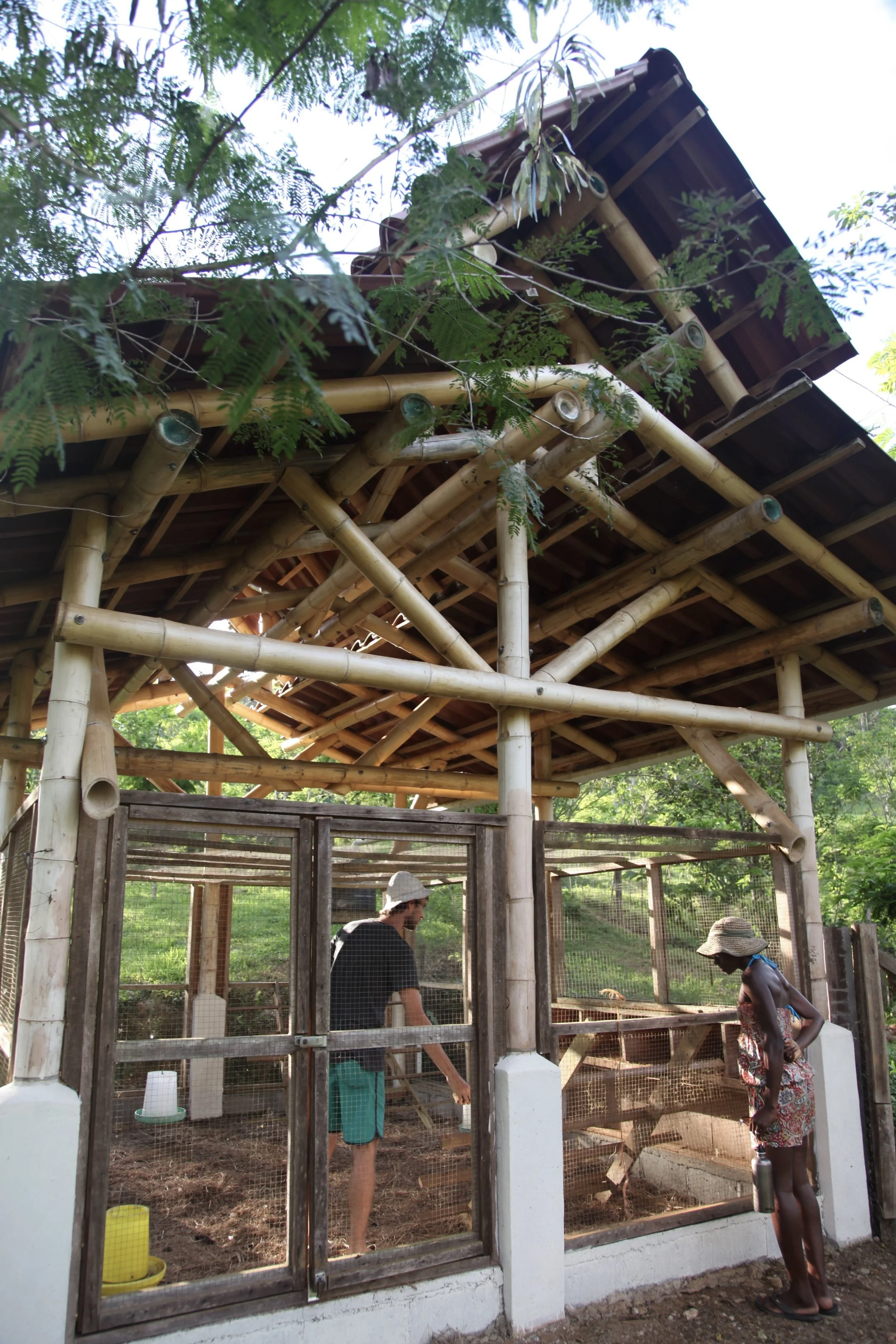 Shared infrastructure at SEED in Costa Rica, supporting everyday life, access, maintenance, and land-based community living.
