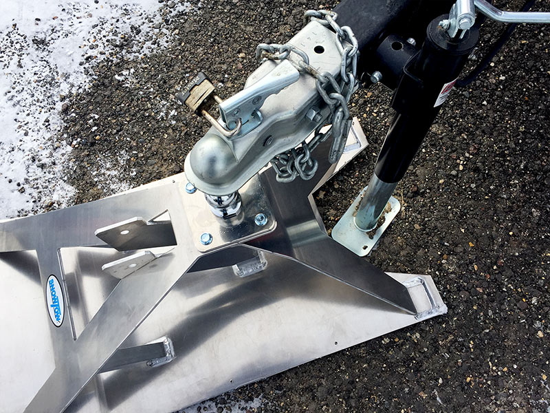 Shown above is Model 2267 with a late model Ice Castle. Notice how the increased cut out depth allows for connection to the trailer without moving the tongue jack or dropping the trailer down. Once the ski is connected the tongue jack can be removed or rotated into travel position.