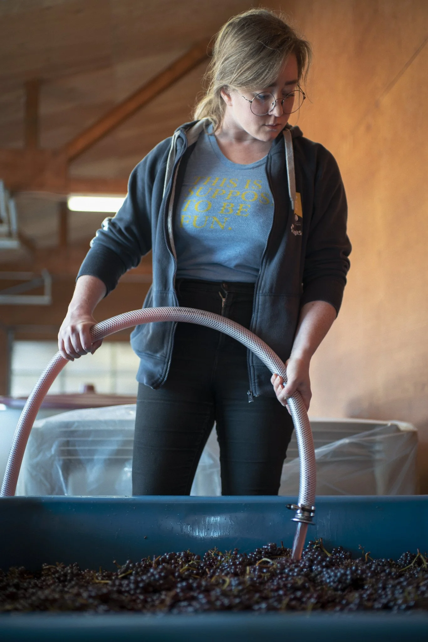 Jenny, pumping over our pinot noir ferments during harvest.