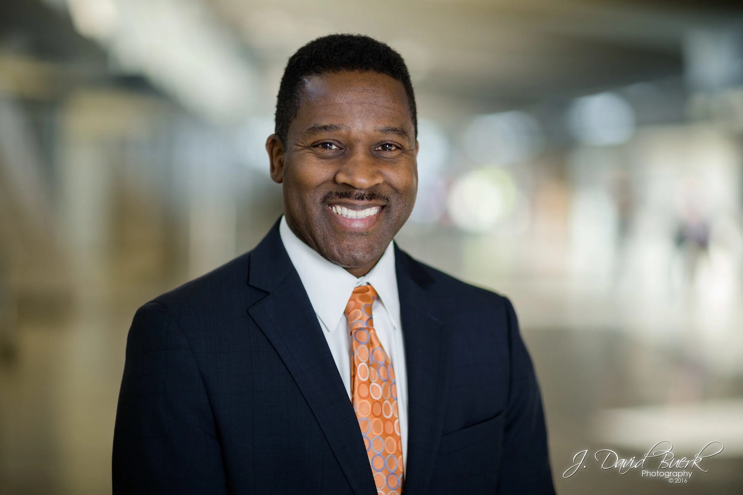 Portrait of Dennis Hazell, Customer Service Manager of Washington Dulles International Airport, photographed in Eero Saarinen's historic Main Terminal Building.