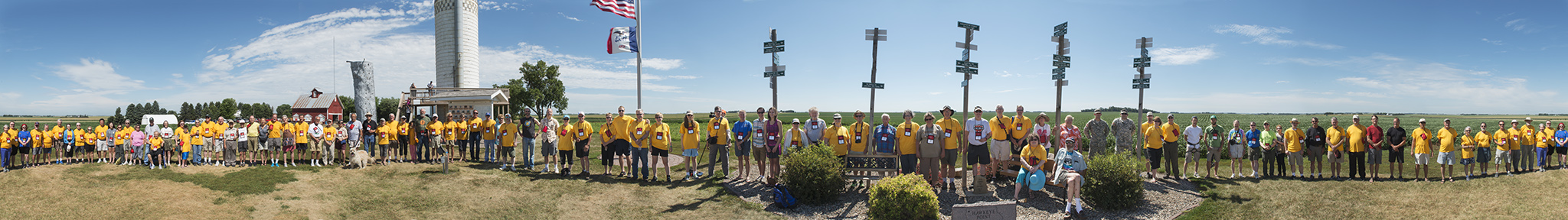 Convention attendees at Hawkeye Point, Iowa. The panorama makes it seem like they are standing in a straight line, when they are in fact encircling me.