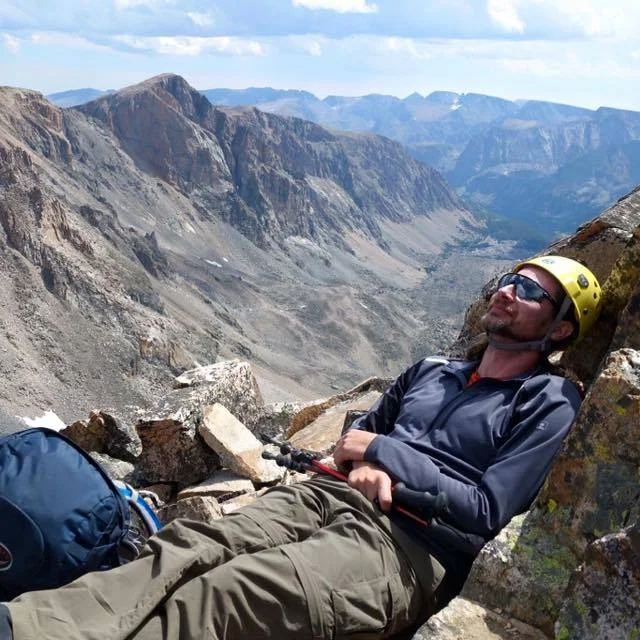 Taking a break before the final climb to the summit. (photo by Roger)