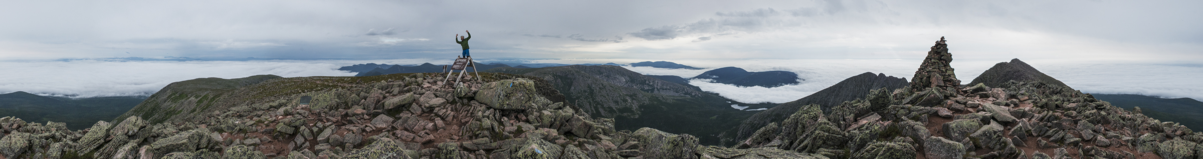 Mount Katahdin, highpoint of Maine. The man on the sign is 'Sniffles', an AT section hiker finishing almost 800 miles of the AT.