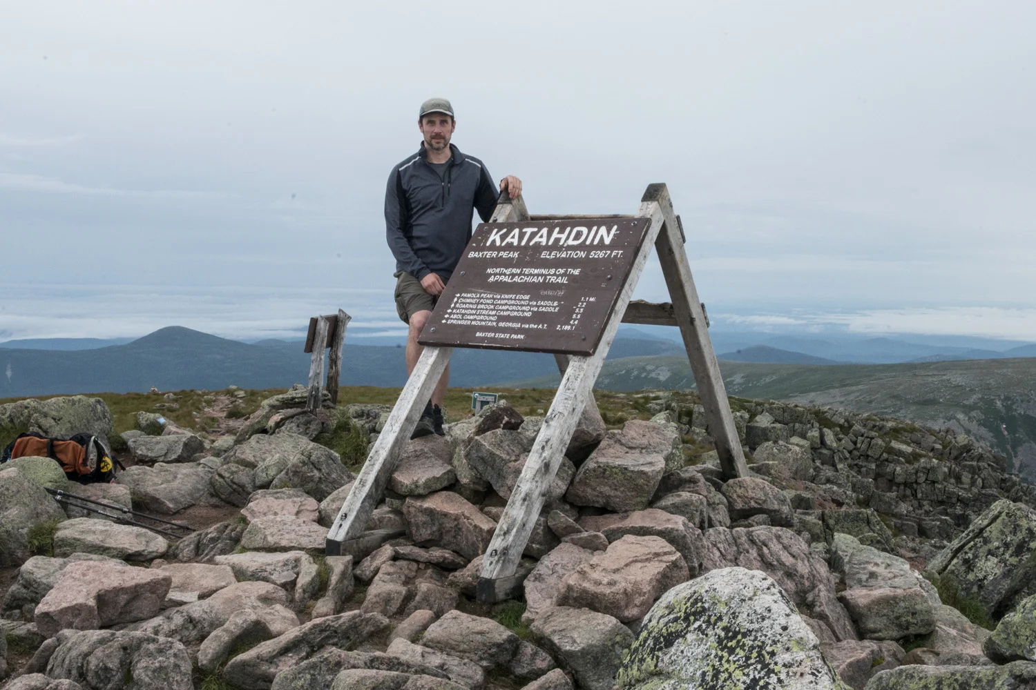 Me with the summit sign on Baxter Peak