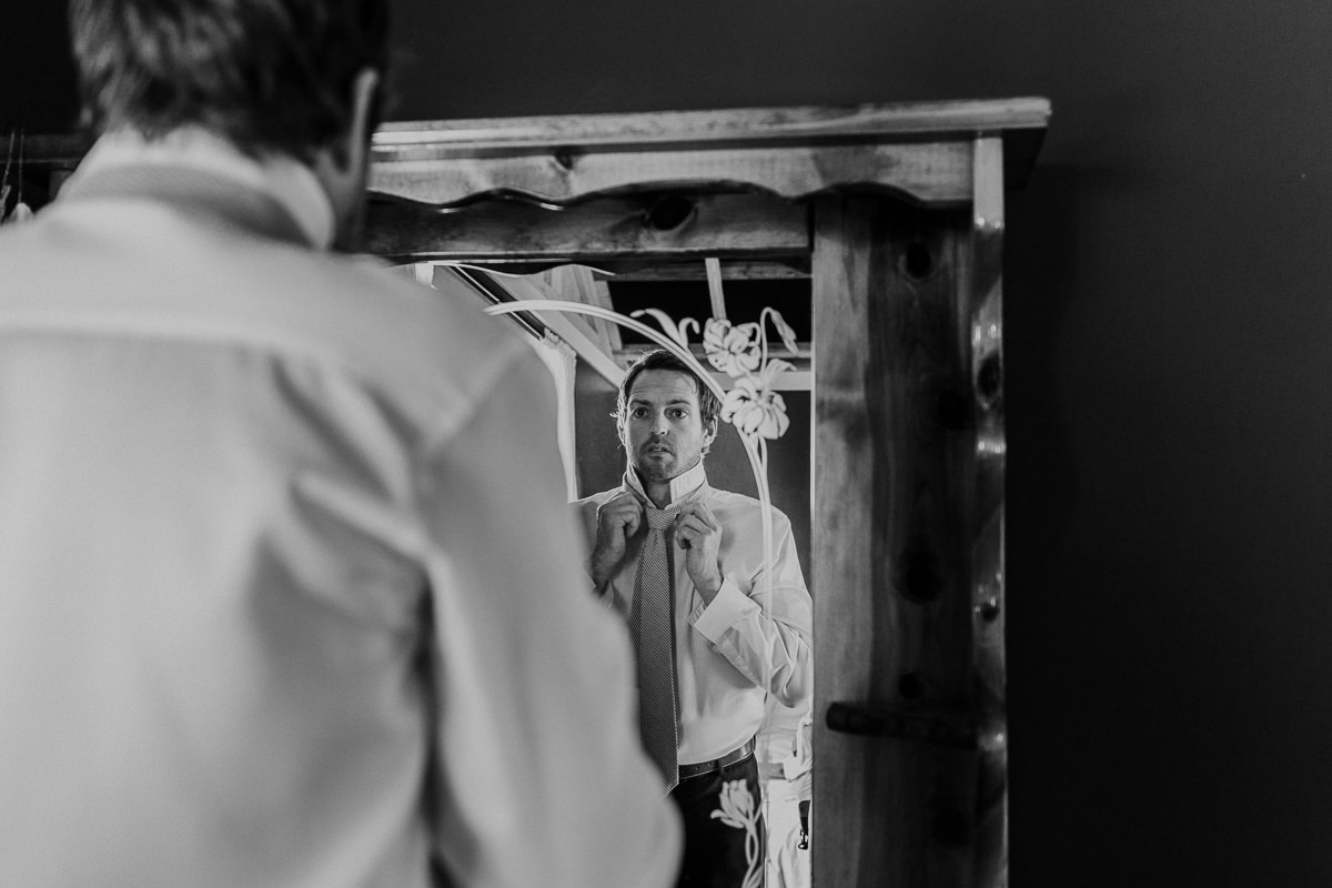 Groom getting ready Shylynn Ranch wedding