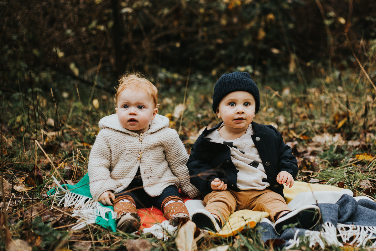 Babies on picnic blanket in park fall family photos