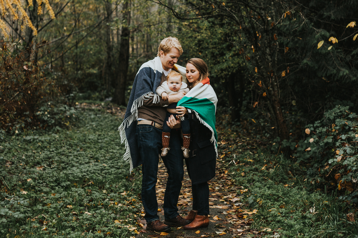 Family photo in the woods in Hudson's Bay blanket