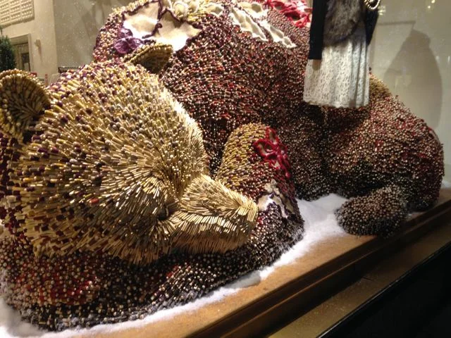 A sleeping bear, intricately assembled by countless tiny spools of thread. I wish I had taken photos of the work while it was still in progress to illustrate the time and effort that went into this unique creature.