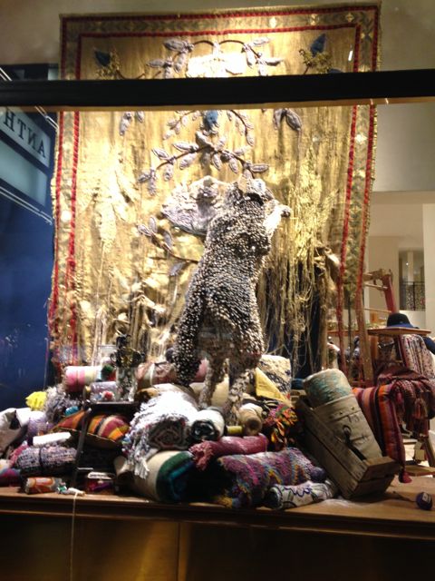 Gorgeous juxtaposition of a wolf scaling a beautifully woven textile, shredding the material as she moves upward.