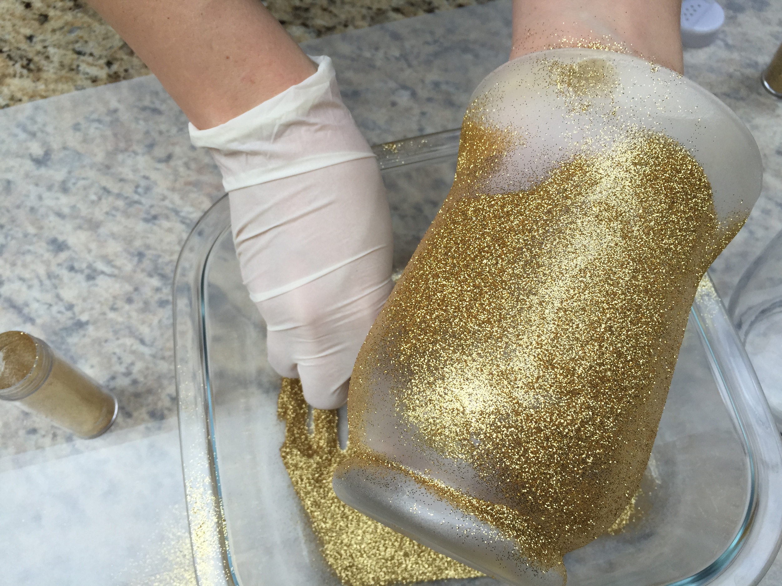 Once I used up the first tube of glitter, I then went back and picked it up out of the bowl and covered the rest of the vase.