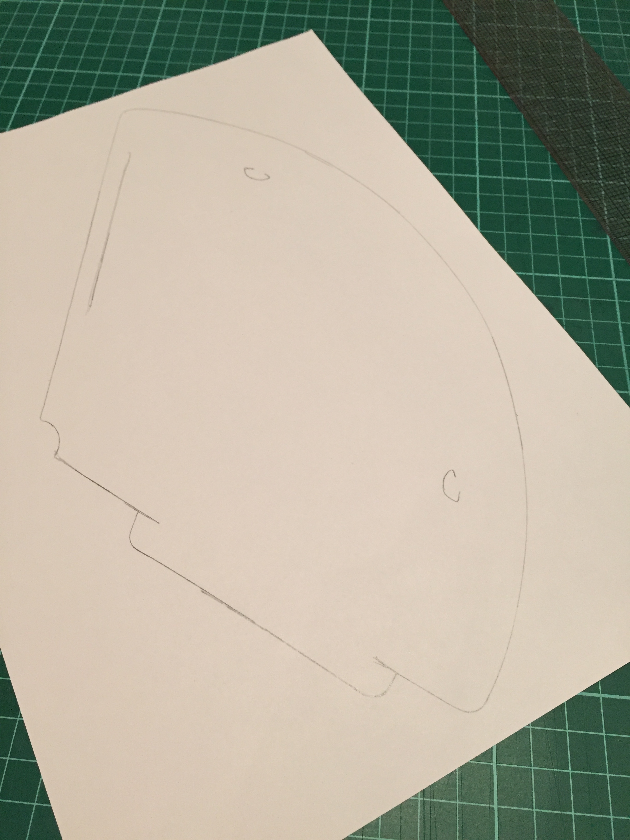 Only cut where the pencil lines are on the inside because this creates the flaps you need to put it together. I used a ruler to cut along the straight line with a craft knife and used the craft knife free hand to cut the little curves - be very gentle with this and it's easier to use mainly the tip of the knife to cut.