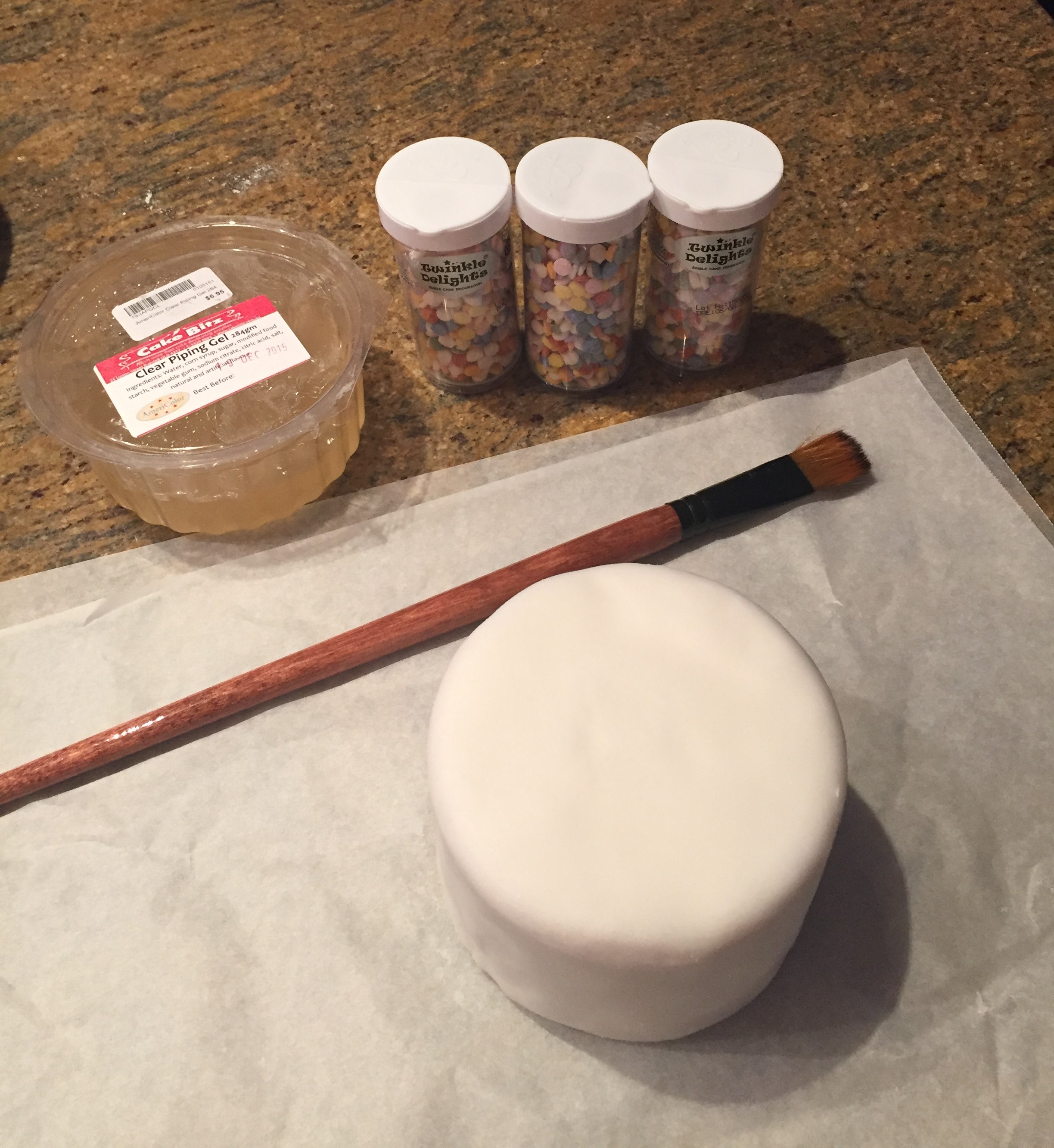 I started on the top tier as it was the first time I was working with this effect, that way I could tell properly how much sprinkles I needed to use and the best way to apply them. Because I was was leaving the sprinkles as they came, I needed to be extra careful as you will be able to see any mistakes or mess. 