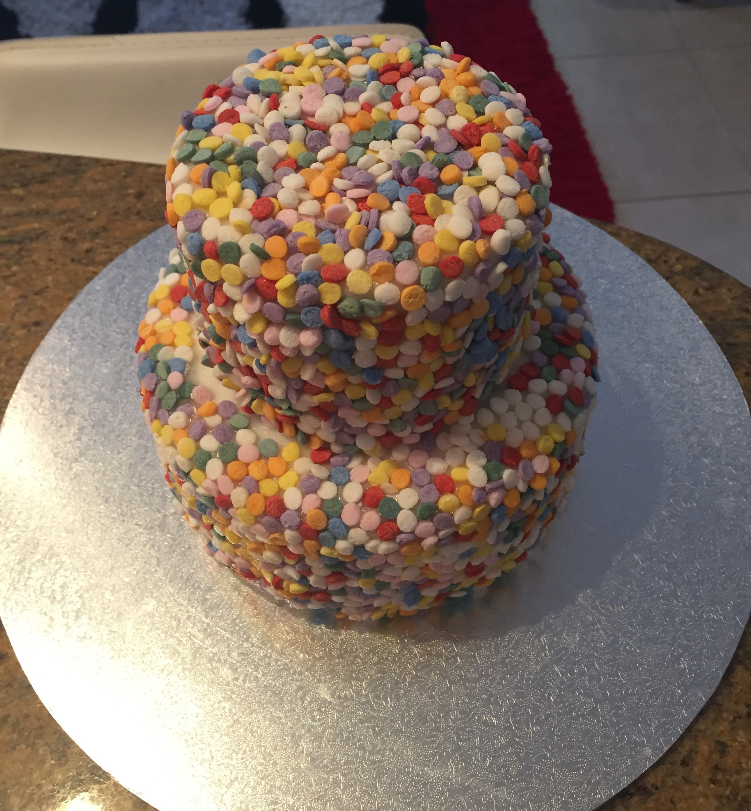 These tiers aren't too heavy/big so I was able to finish the two together and then place onto the third tier last. Normally it is best to assemble from the bottom tier and work your way up -all depends on how you need to decorate and assemble (just keep that in mind).