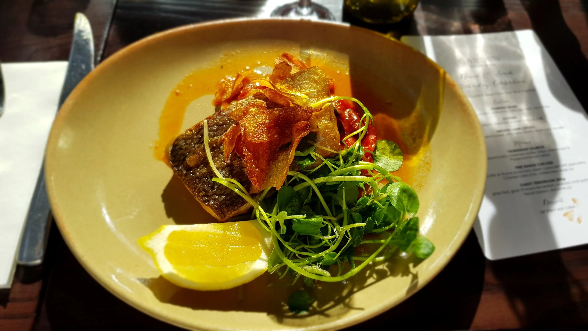 TASMANIAN SALMON: Peperonata, rosemary kipfler chips, watercress and preserved lemon salad