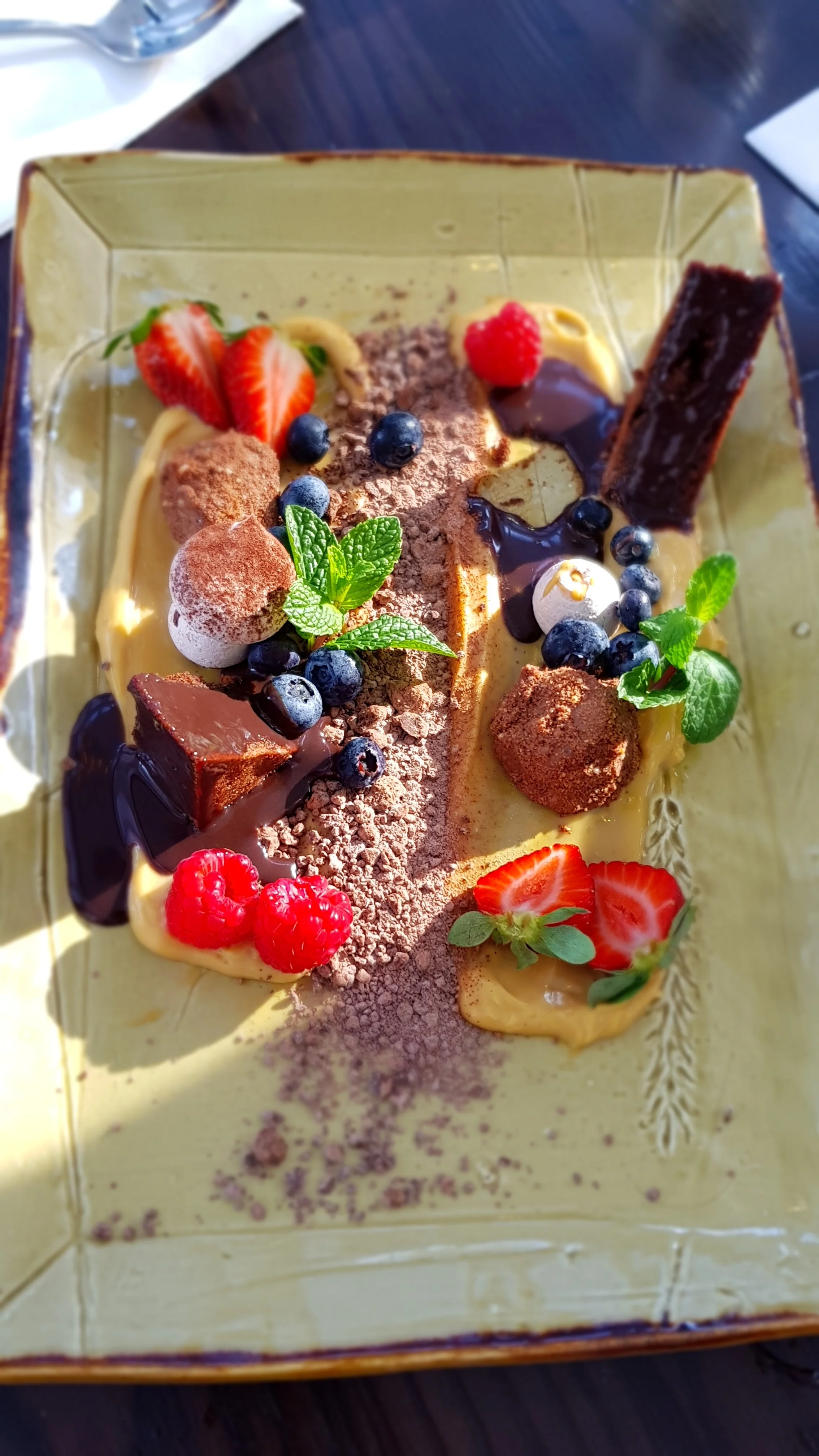 GARDEN CHOCOLATE PATCH: Chocolate soil, chocolate mushrooms, iced milk chocolate truffles, flourless chocolate cake, salted caramelised white chocolate ganache 