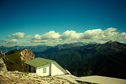 A shed on the top of the mountains. Talk about a window view...