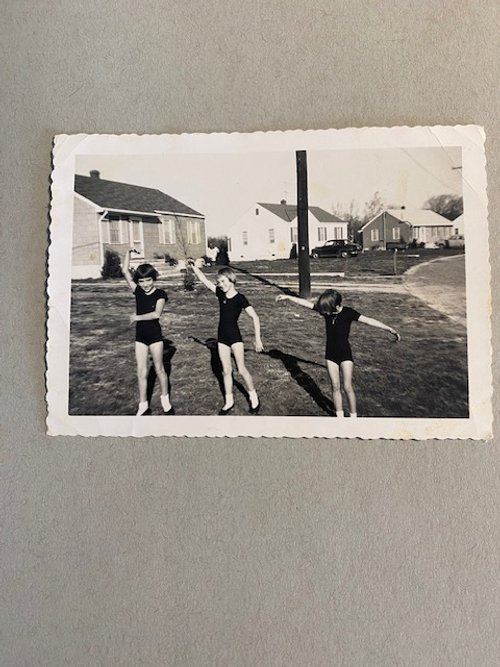 l-r: Deb, Priscilla, and Abby Baker perform "ballet on the battlefield" (Dec. 1954)