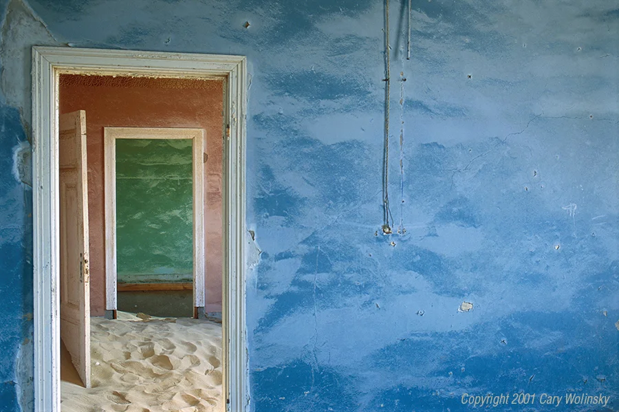  Sand House Series, Blue, Pink, Green: Kolmanskop, near Luderitz, Namibia, 2001:  I stumbled upon Kolmanskop, an abandoned mining town near Luderitz while working on a story about diamonds for the National Geographic Magazine. In 1908, Namibia was 